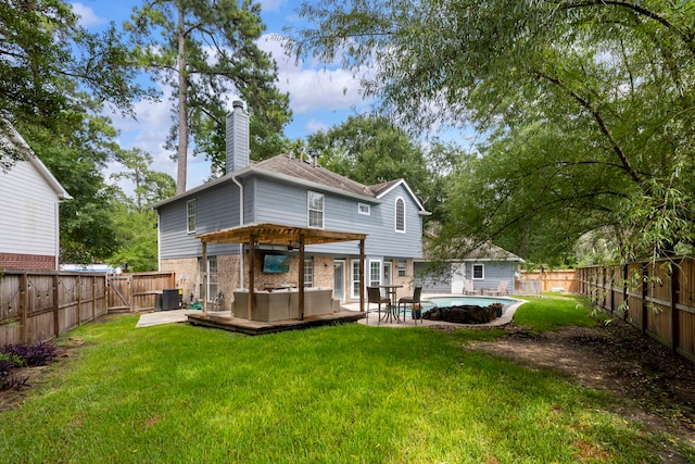 19 Shinyrock Pl, The Woodlands, TX 77381 - rear view of property featuring a fenced backyard, a chimney, brick siding, a pergola, and an outdoor hangout area