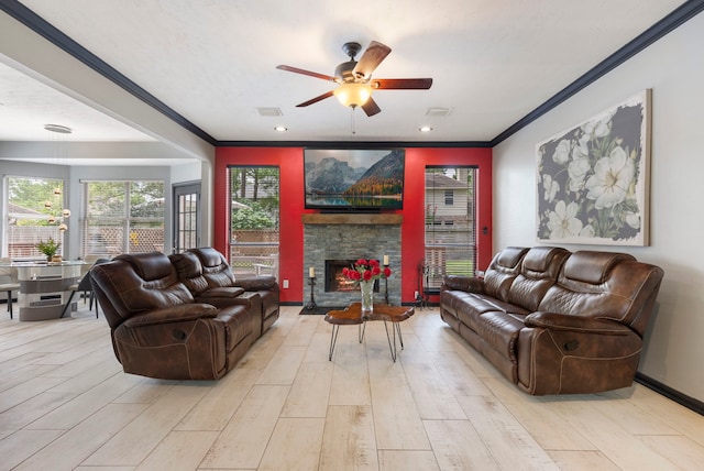96 N Acacia Park Cir, The Woodlands, TX 77382 - living room featuring crown molding, ceiling fan, a fireplace, light wood-style floors, and recessed lighting
