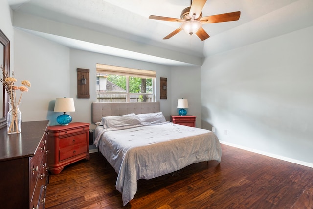 96 N Acacia Park Cir, The Woodlands, TX 77382 - bedroom with dark wood-style flooring and ceiling fan