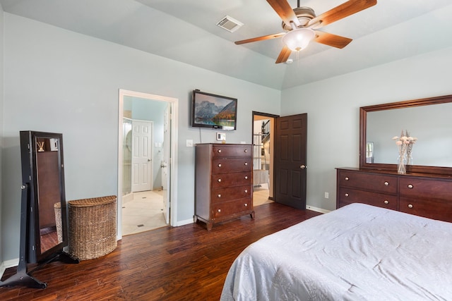 96 N Acacia Park Cir, The Woodlands, TX 77382 - bedroom with wood finished floors, ensuite bath, and a ceiling fan