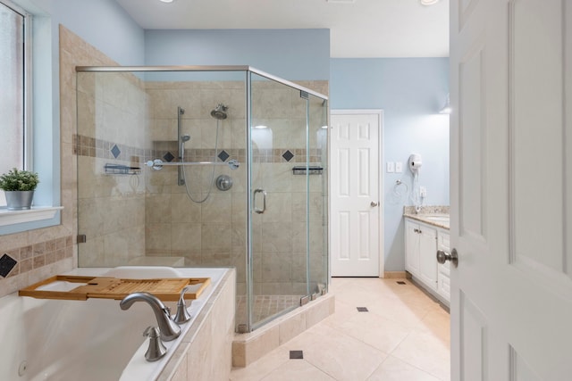 96 N Acacia Park Cir, The Woodlands, TX 77382 - bathroom featuring tile patterned floors, a shower stall, a whirlpool tub, and vanity