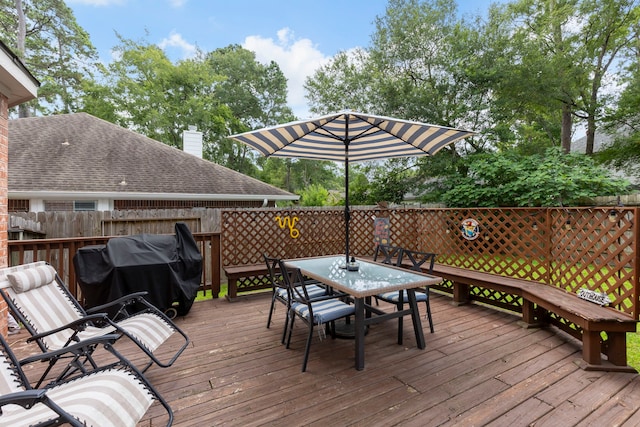 96 N Acacia Park Cir, The Woodlands, TX 77382 - deck featuring outdoor dining space and area for grilling