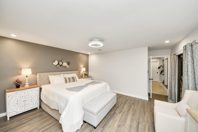 6803 Las Brisas Dr, Houston, TX 77083 - bedroom featuring wood finished floors and recessed lighting