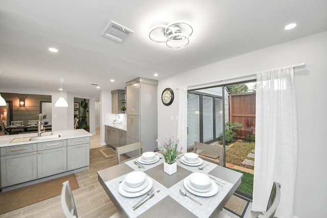 6803 Las Brisas Dr, Houston, TX 77083 - dining area with light wood-style floors and recessed lighting
