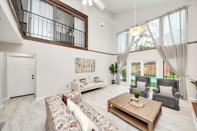 6803 Las Brisas Dr, Houston, TX 77083 - living area featuring a towering ceiling and a ceiling fan