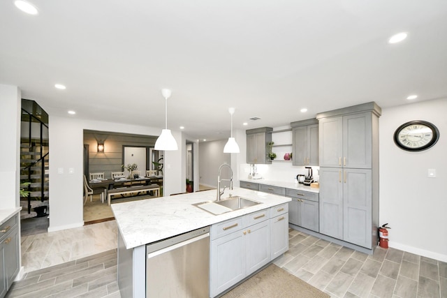 6803 Las Brisas Dr, Houston, TX 77083 - kitchen with dishwasher, open shelves, gray cabinets, wood finish floors, and recessed lighting