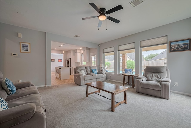 21002 Beech Landing Ln, Katy, TX 77450 - living room with light colored carpet and ceiling fan