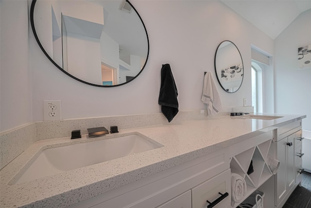 21002 Beech Landing Ln, Katy, TX 77450 - full bathroom with double vanity and vaulted ceiling