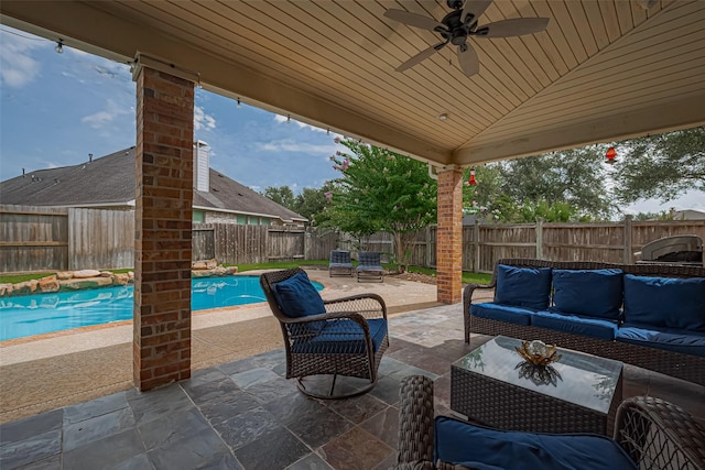 21002 Beech Landing Ln, Katy, TX 77450 - fenced backyard with an outdoor living space, a patio area, and a ceiling fan