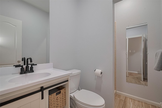 21002 Beech Landing Ln, Katy, TX 77450 - bathroom with vanity and wood finished floors