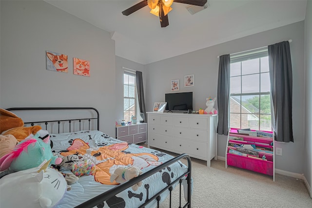 21002 Beech Landing Ln, Katy, TX 77450 - bedroom featuring multiple windows, light carpet, ceiling fan, and lofted ceiling