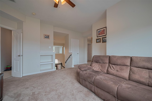 21002 Beech Landing Ln, Katy, TX 77450 - carpeted living room featuring ceiling fan and built in shelves
