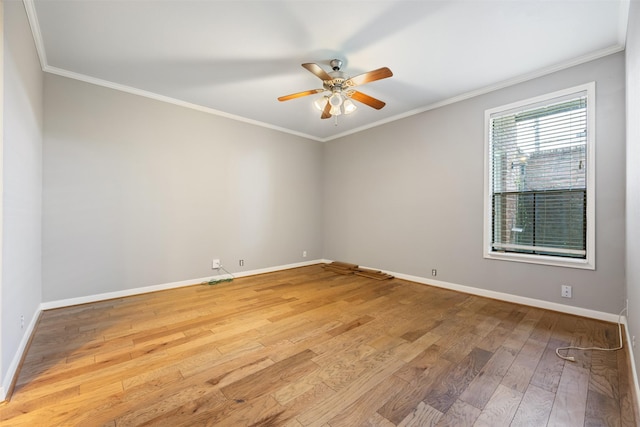 2829 Timmons Ln Unit 101, Houston, TX 77027 - empty room featuring hardwood / wood-style flooring, a ceiling fan, and ornamental molding