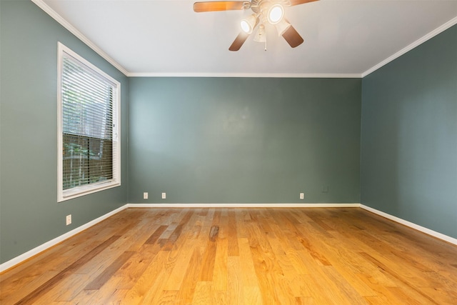 2829 Timmons Ln Unit 101, Houston, TX 77027 - unfurnished room with ornamental molding, a ceiling fan, and wood finished floors