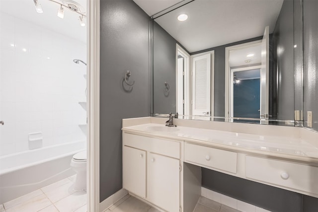 2829 Timmons Ln Unit 101, Houston, TX 77027 - bathroom featuring double vanity, tile patterned flooring, and shower / washtub combination