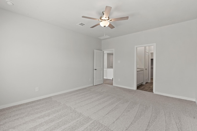 645 Blackberry Ln, La Marque, TX 77568 - unfurnished bedroom featuring carpet, connected bathroom, and a ceiling fan