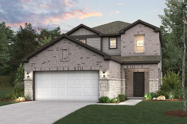 645 Blackberry Ln, La Marque, TX 77568 - view of front of property featuring concrete driveway, a lawn, stone siding, an attached garage, and board and batten siding