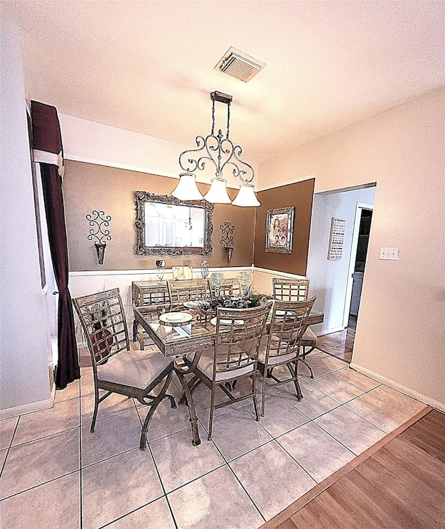 4134 Teal Valley Ct, Fresno, TX 77545 - dining room featuring light tile patterned floors and baseboards