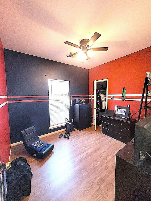 4134 Teal Valley Ct, Fresno, TX 77545 - exercise area featuring wood finished floors and ceiling fan
