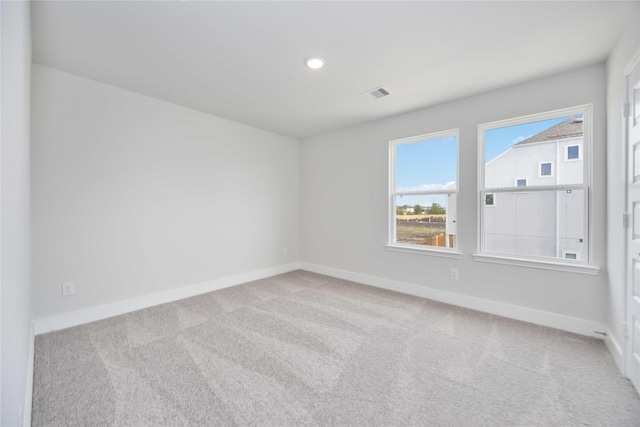 13208 Opera Dr, Houston, TX 77047 - carpeted spare room with baseboards and recessed lighting