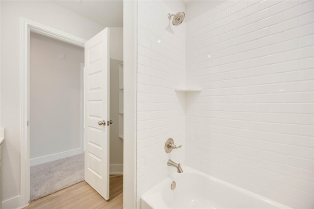 13208 Opera Dr, Houston, TX 77047 - bathroom with wood finished floors, shower / bath combination, and vanity