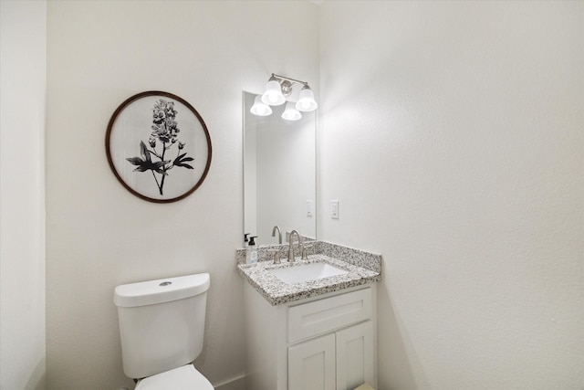 2201 Maple St, Liberty, TX 77575 - half bathroom with vanity and toilet