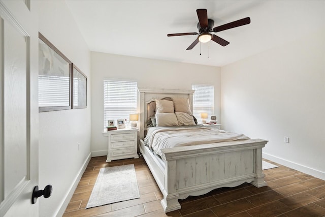 2201 Maple St, Liberty, TX 77575 - bedroom featuring wood tiled floors and ceiling fan