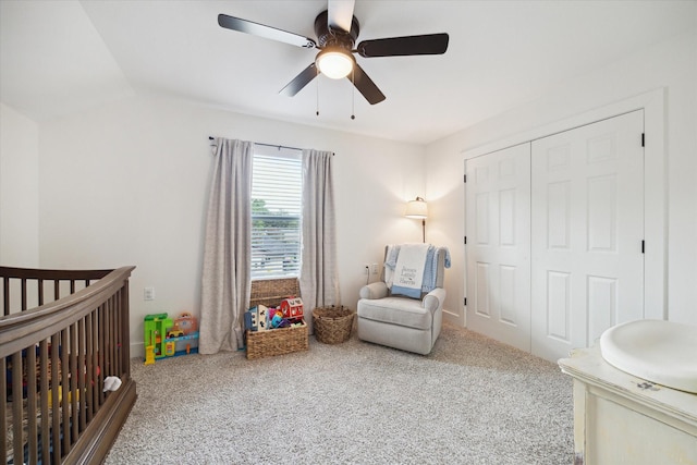 2201 Maple St, Liberty, TX 77575 - carpeted bedroom with a crib, a closet, and ceiling fan
