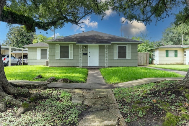 7734 El Rancho St, Houston, TX 77087 - view of front of property featuring roof with shingles
