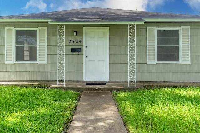 7734 El Rancho St, Houston, TX 77087 - entrance to property with roof with shingles