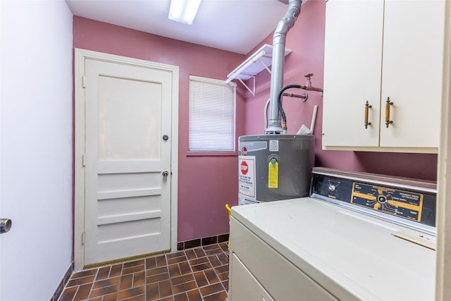 7734 El Rancho St, Houston, TX 77087 - washroom with washer / clothes dryer, electric water heater, cabinet space, and brick patterned flooring