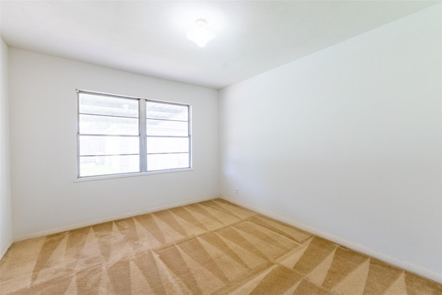 7734 El Rancho St, Houston, TX 77087 - unfurnished room featuring light carpet and baseboards