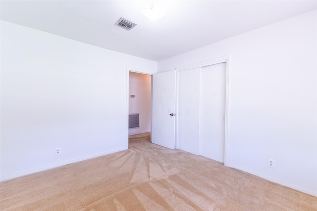 7734 El Rancho St, Houston, TX 77087 - unfurnished bedroom with carpet floors and a closet