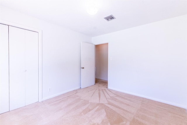 7734 El Rancho St, Houston, TX 77087 - unfurnished bedroom featuring carpet flooring and a closet