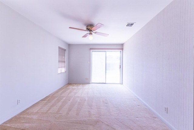 7734 El Rancho St, Houston, TX 77087 - spare room featuring light carpet and ceiling fan