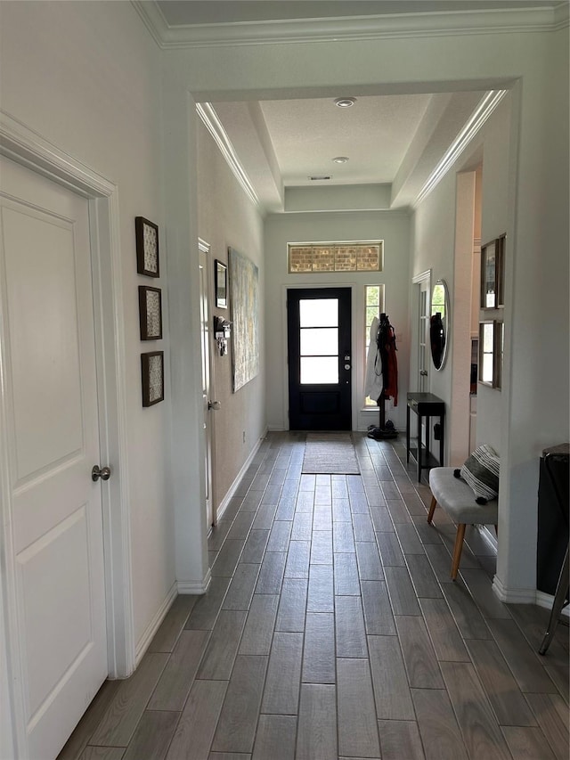 20130 New Sunrise Trl, Cypress, TX 77433 - foyer entrance with dark wood finished floors, a raised ceiling, and ornamental molding