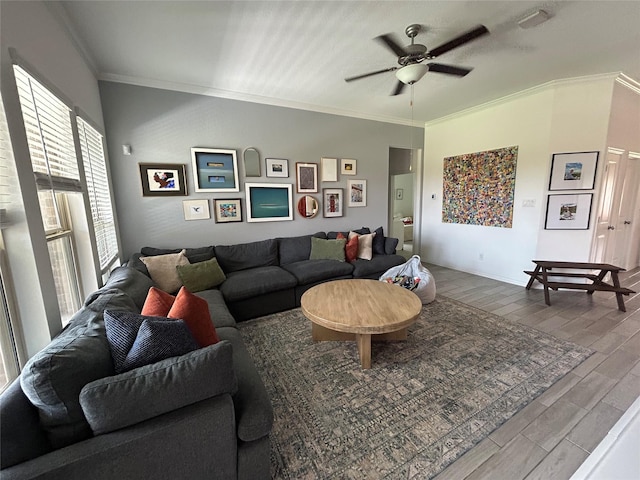 20130 New Sunrise Trl, Cypress, TX 77433 - living area featuring crown molding, wood finished floors, and ceiling fan