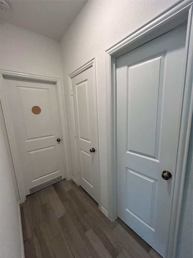 20130 New Sunrise Trl, Cypress, TX 77433 - corridor with dark wood finished floors