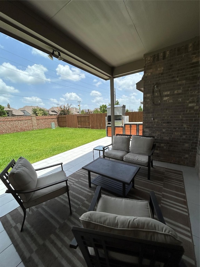 20130 New Sunrise Trl, Cypress, TX 77433 - wooden deck with an outdoor hangout area, a fenced backyard, and a patio area