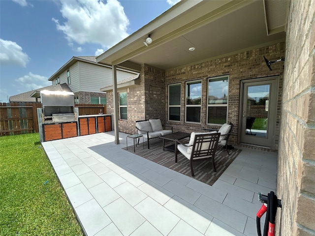 20130 New Sunrise Trl, Cypress, TX 77433 - view of patio / terrace featuring exterior kitchen and outdoor lounge area