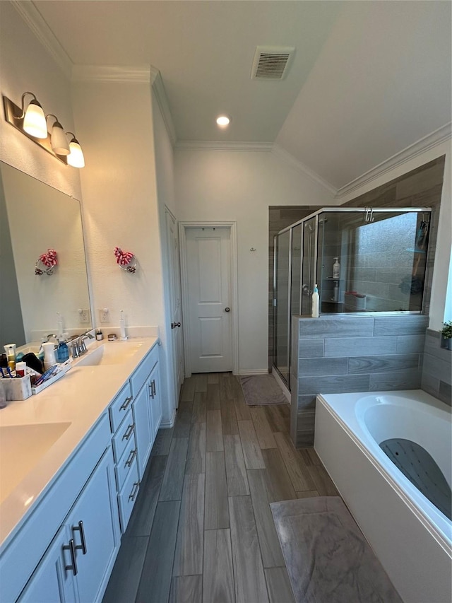 20130 New Sunrise Trl, Cypress, TX 77433 - full bath featuring double vanity, a stall shower, a garden tub, ornamental molding, and lofted ceiling