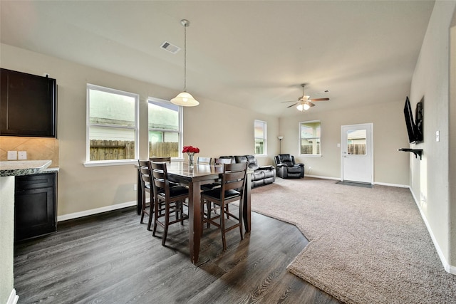 7427 Wheatley Gardens Dr, Houston, TX 77016 - dining space featuring plenty of natural light, dark wood-type flooring, and ceiling fan
