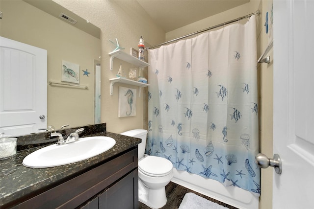 7427 Wheatley Gardens Dr, Houston, TX 77016 - full bathroom with vanity, shower / tub combo, and wood finished floors