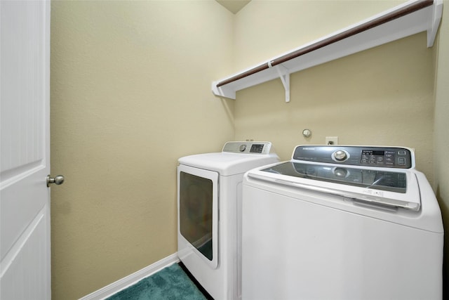 7427 Wheatley Gardens Dr, Houston, TX 77016 - laundry room with separate washer and dryer and carpet floors