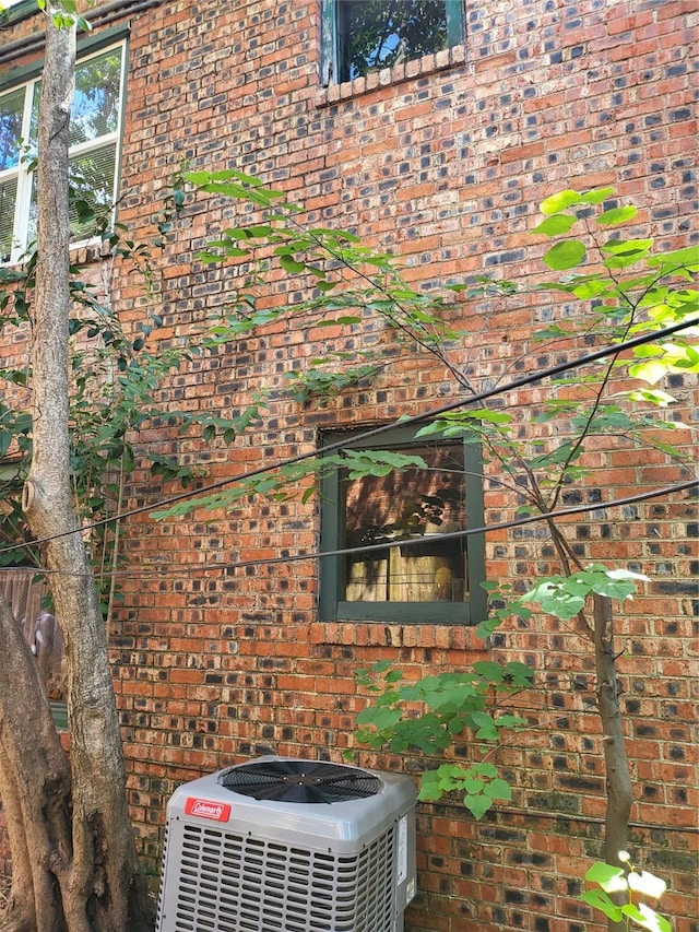1529 Welch St, Houston, TX 77006 - exterior view of brick siding and a cooling unit