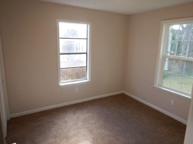 4218 Buck St, Houston, TX 77020 - carpeted spare room featuring baseboards