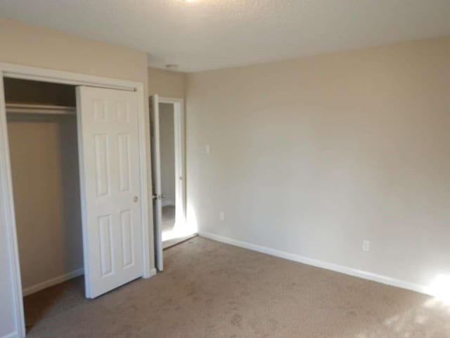 4218 Buck St, Houston, TX 77020 - unfurnished bedroom with carpet flooring and a closet