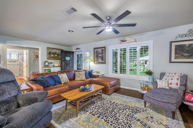 502 Spinn St, Brenham, TX 77833 - living area with wood finished floors and ceiling fan