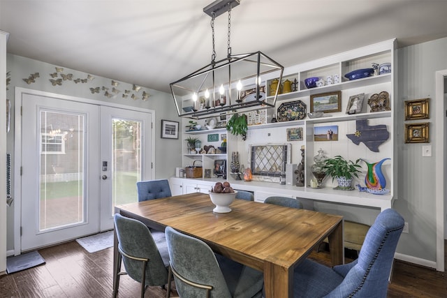 502 Spinn St, Brenham, TX 77833 - dining space with a chandelier, dark wood-type flooring, and french doors