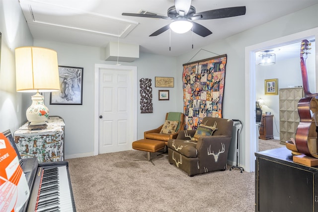 502 Spinn St, Brenham, TX 77833 - carpeted living room with attic access and a ceiling fan